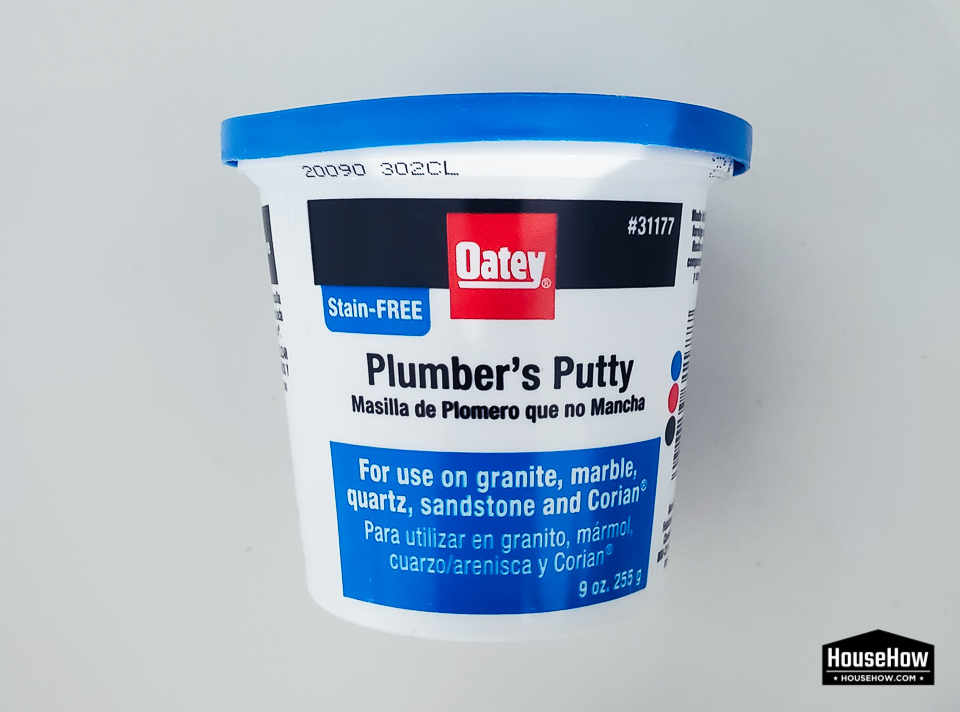 Plumber's putty tends to leave a greasy stain on acid resistant steel which is quite difficult to clean. The best solution in this situation is to use "Stain-free" Plumber's Putty by Oatey © HouseHow.com