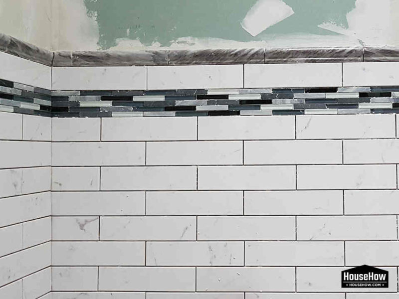 Generally you can install bathroom tiles on drywall, but personally I like to put one concrete board off the floor for added resistance to water and mechanical damage © HouseHow.com