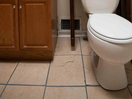 How to Secure a Loose or Wobbly Toilet © HouseHow.com