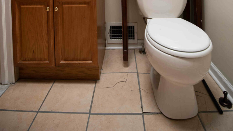 How to Secure a Loose or Wobbly Toilet © HouseHow.com