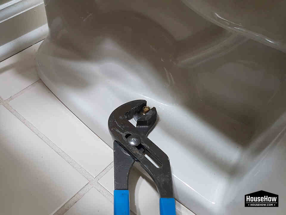 Tightening the screws holding the toilet in most cases solves the problem of a loose toilet